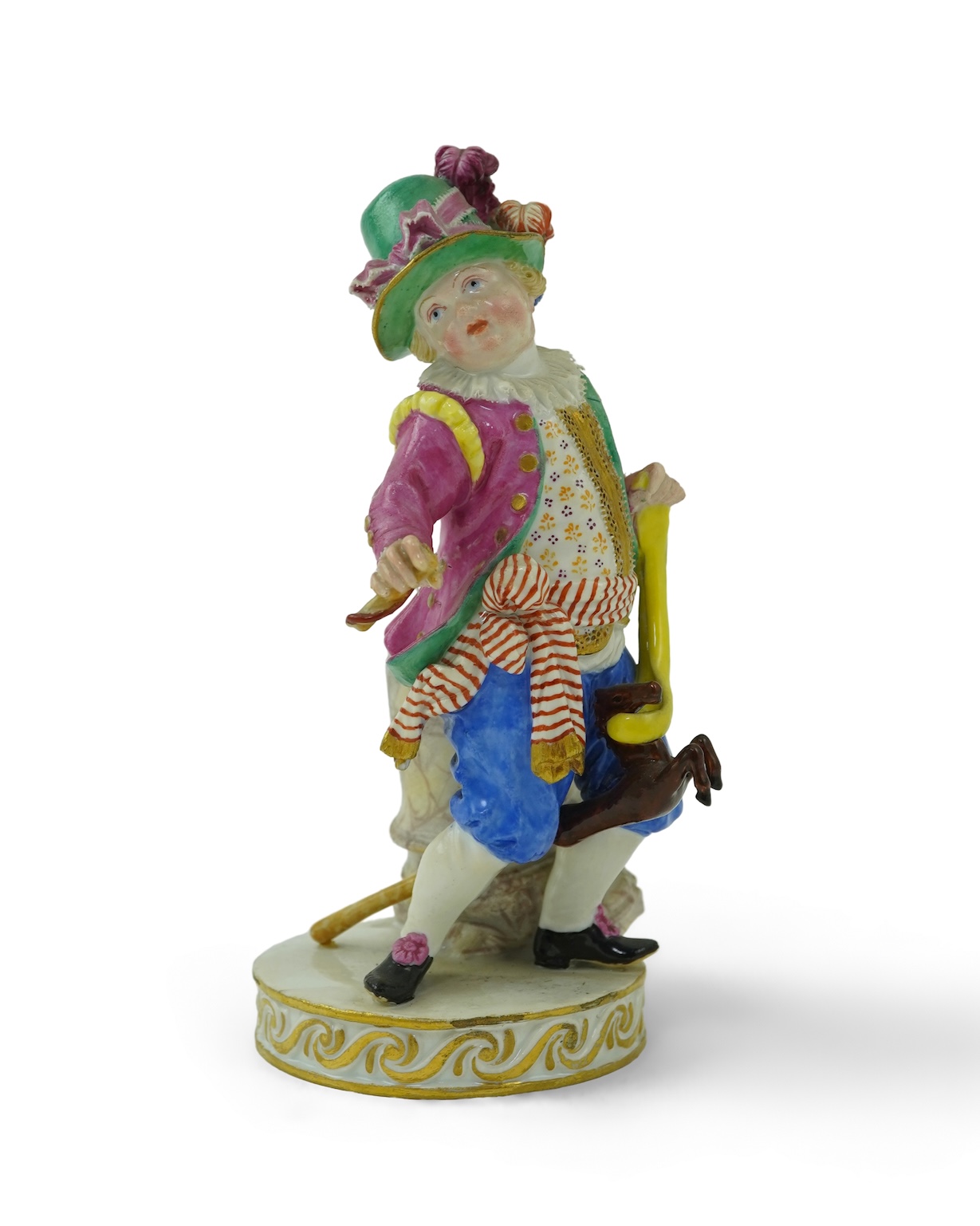 A Meissen figure of a boy on a hobby horse, 19th century